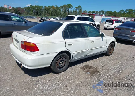 1999 Honda Civic Ex из США, поврежденный, VIN 2HGEJ8642XH552151